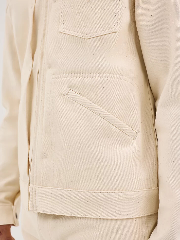 herren-jacke mit blauer glockenstickerei ecru